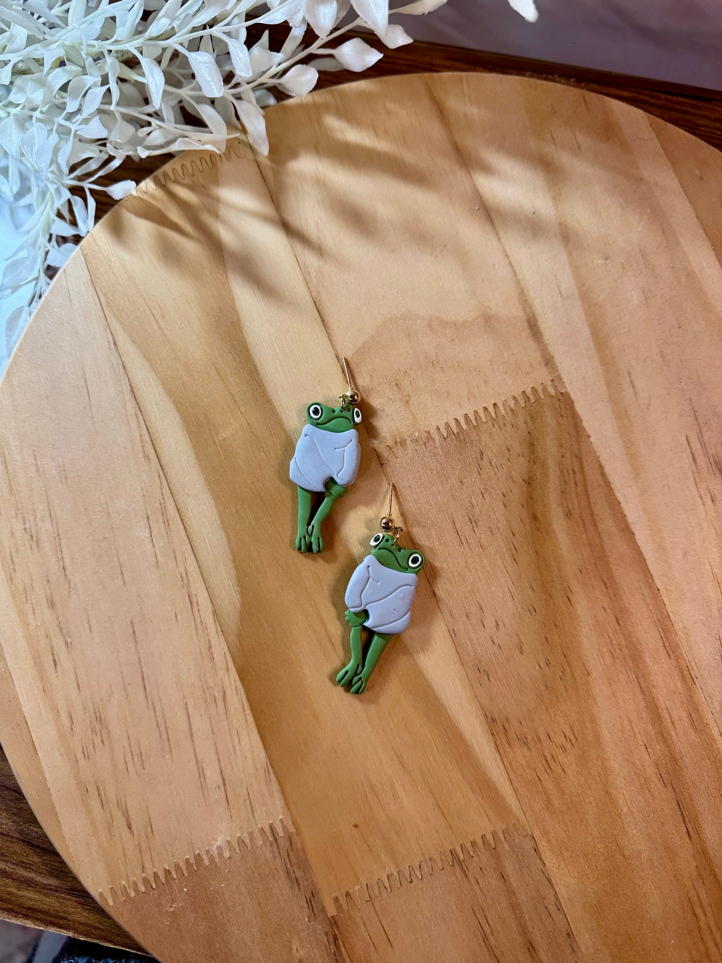 Froggie in light blue sweater