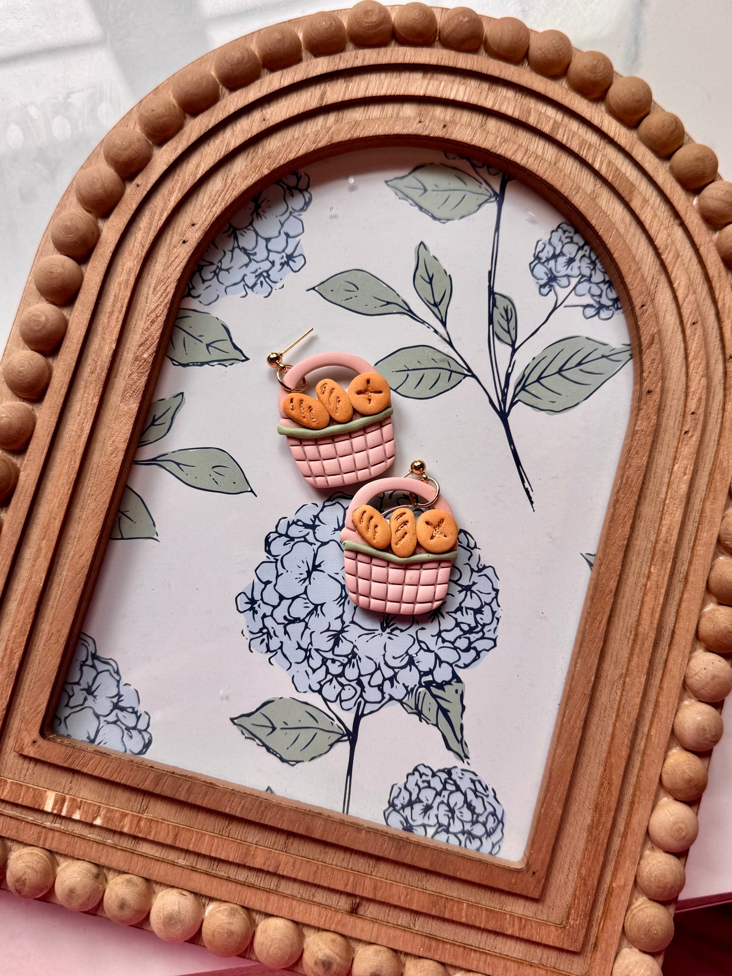 Bread basket dangles