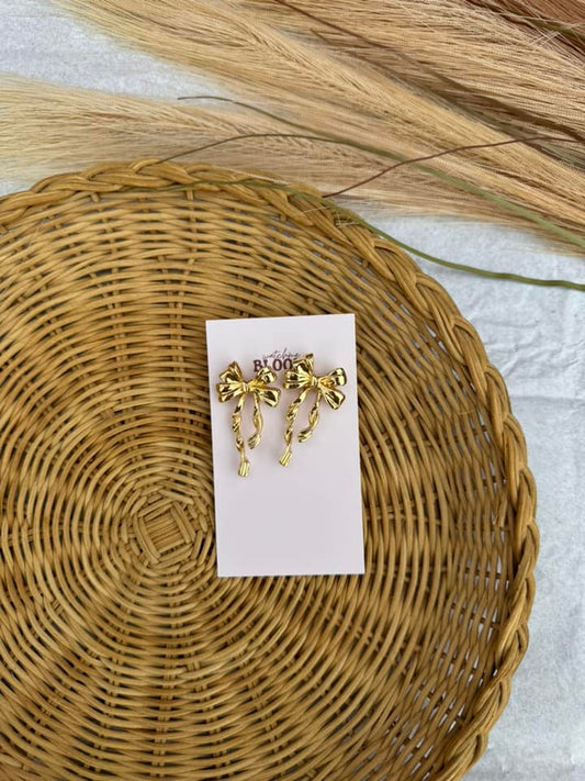 gold metal bow studs