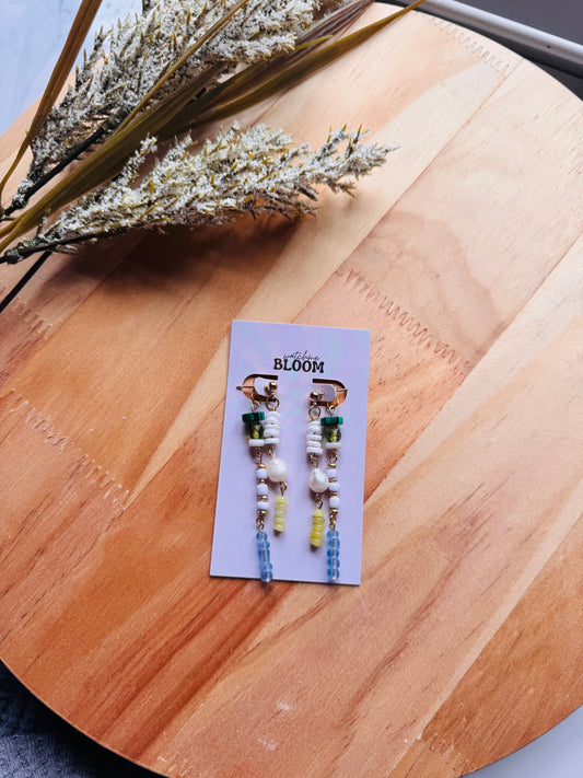 Beaded ear jacket earrings