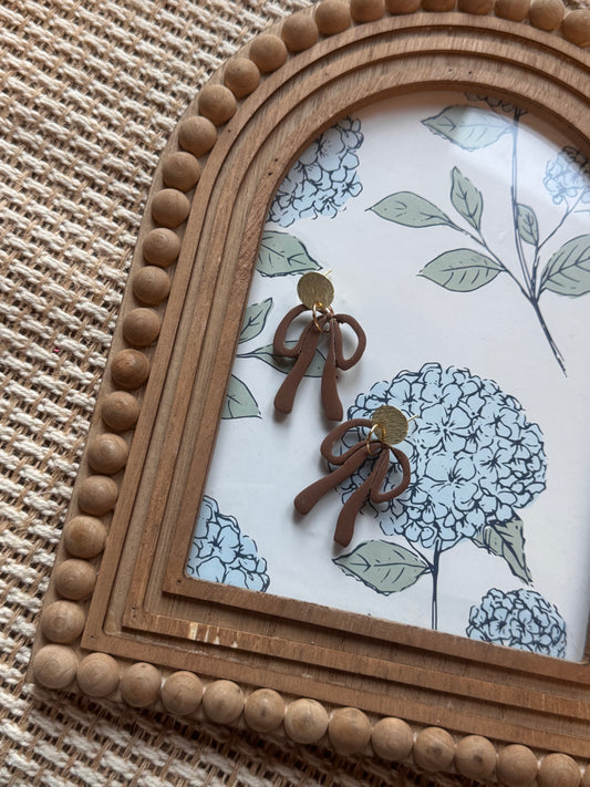 Brown floppy bows